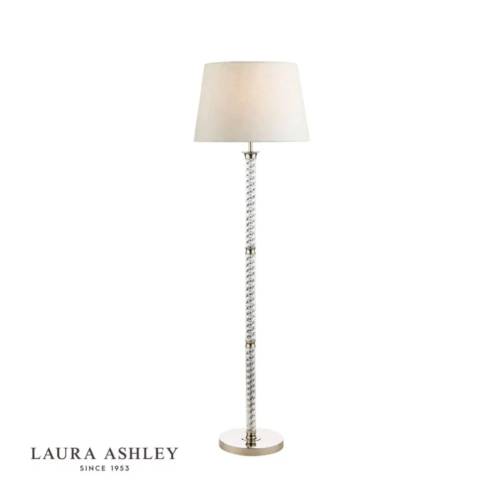 white floor lamp with silver and glass base
