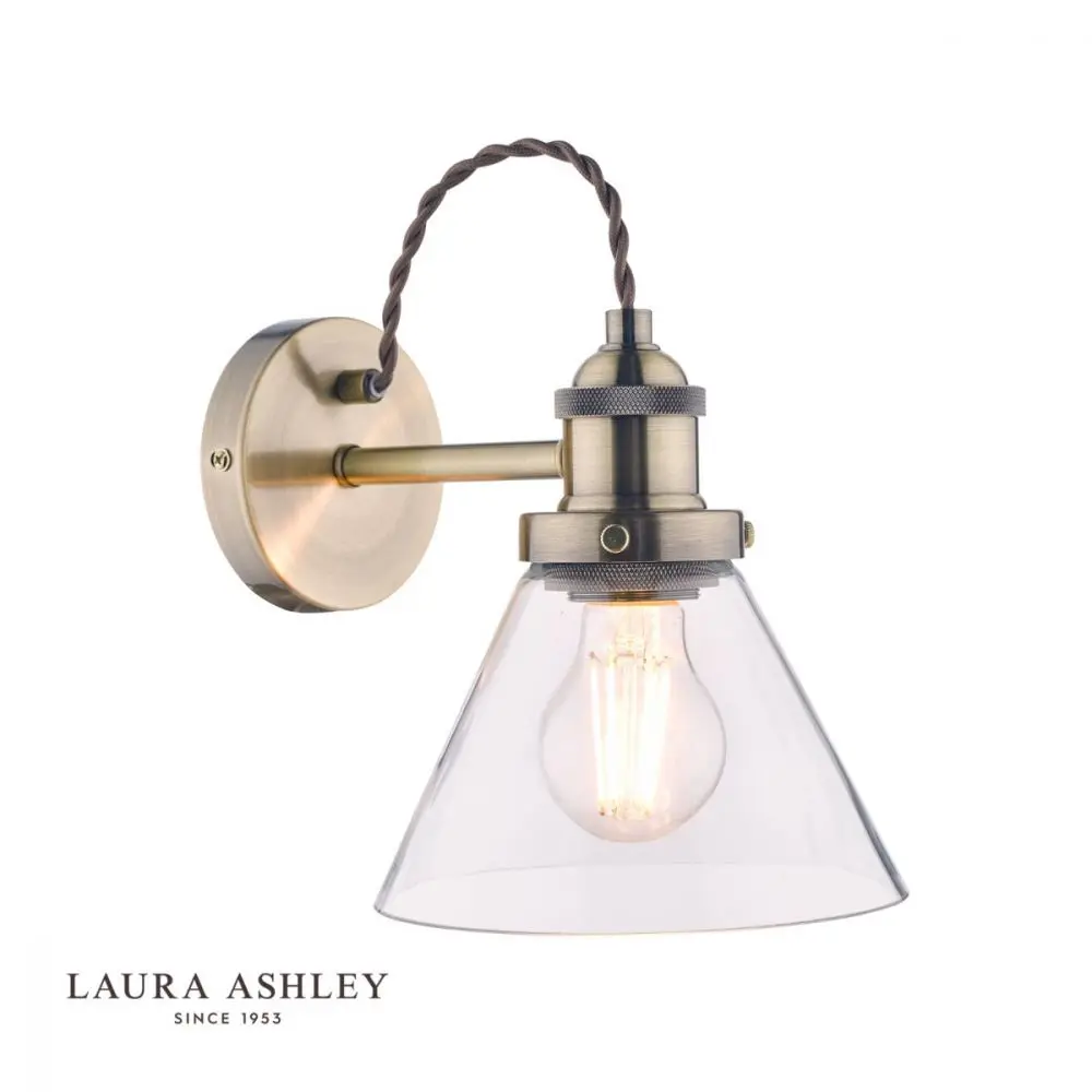 bronze wall light with shadowed glass