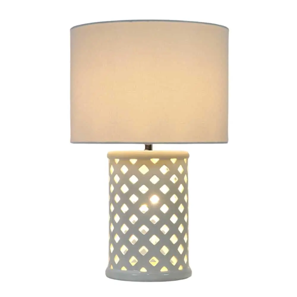 cream lamp with holes in base